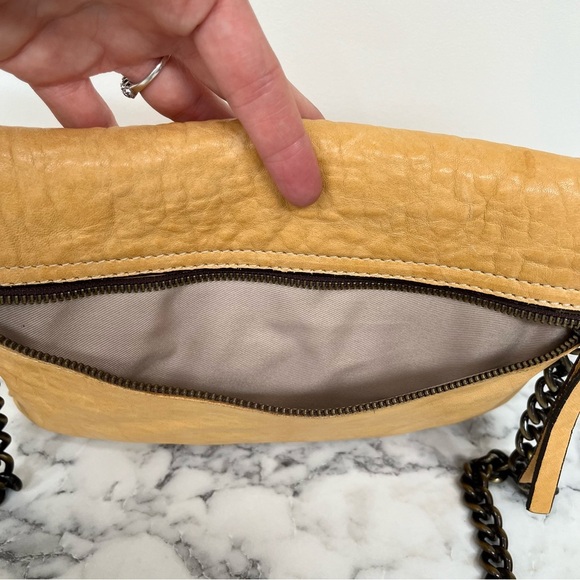 MAXON COLLECTION PEBBLED LEATHER MUSTARD YELLOW ASYMMETRIC FLAP CROSSBODY BAG - Picture 8 of 15